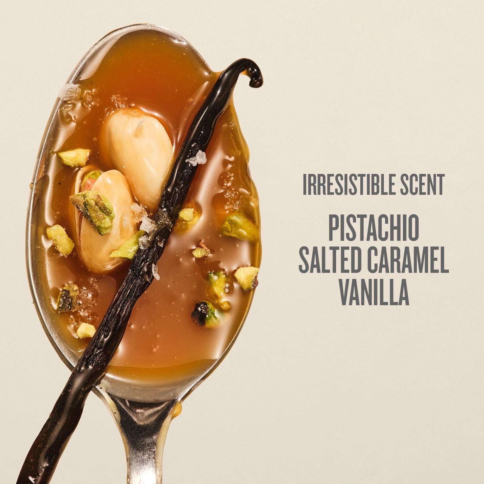 This image is showing the scent notes within Sol de Janeiro Brazilian Bum Bum Cream. The image is of a spoon that has salted caramel, pistachios and a vanilla bean on it.
The copy on the image reads as follows: irresistible scent pistachio, salted caramel, vanilla