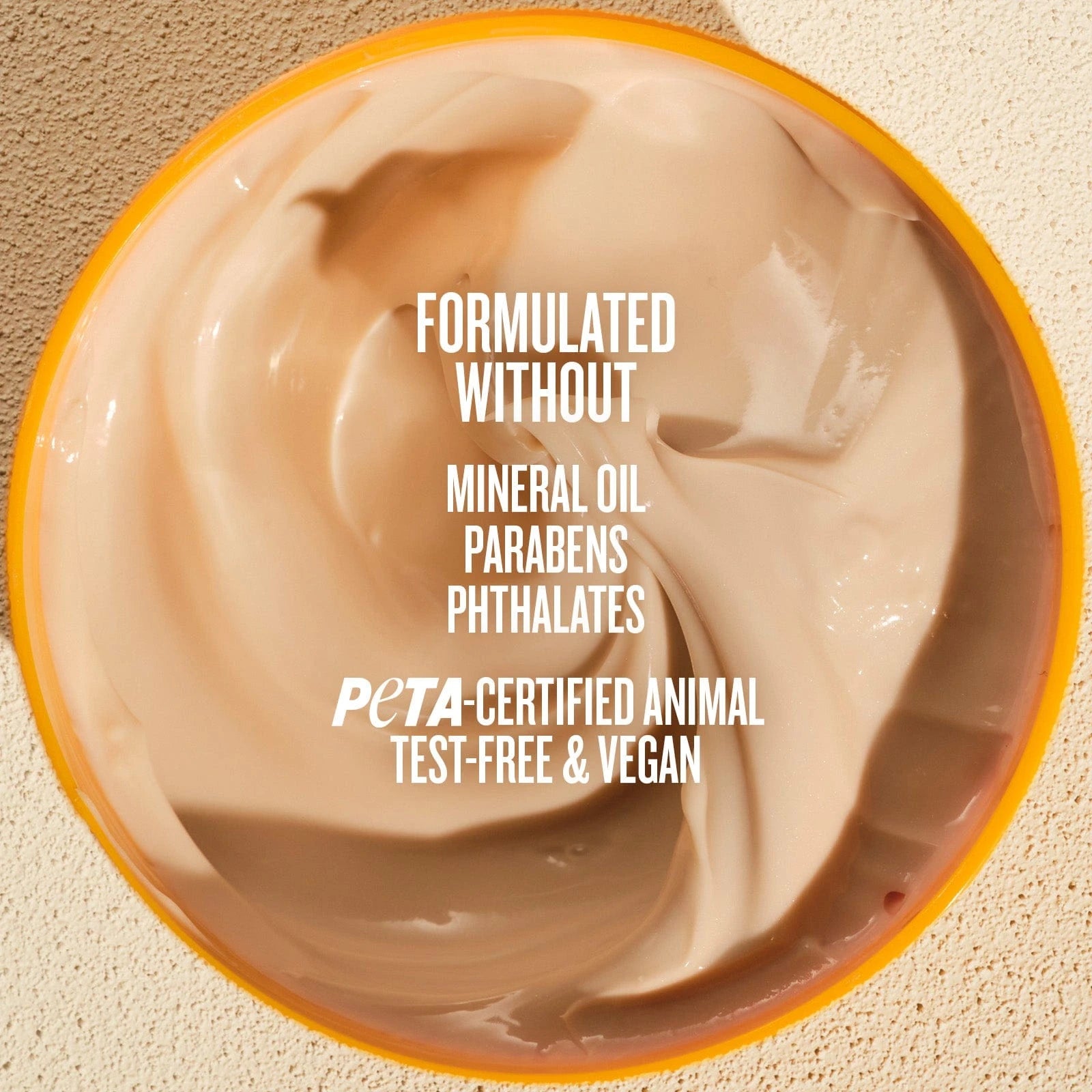 This image is of Sol de Janeiro Brazilian Bum Bum Cream opened so you can see the thick texture. The text on the image reads "Formulated without mineral oil, parabens and phthalates PETA certified animal test-free & vegan."