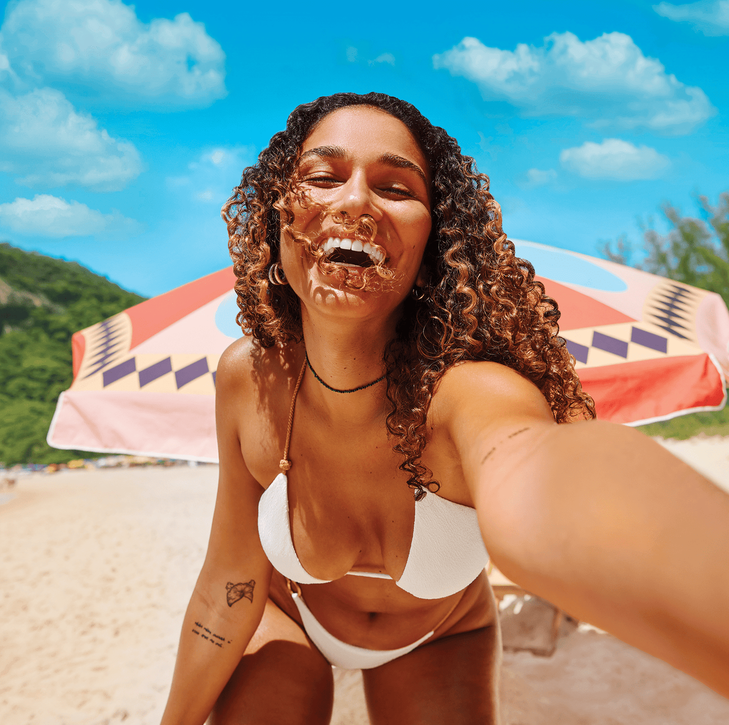 Model smiling at the beach