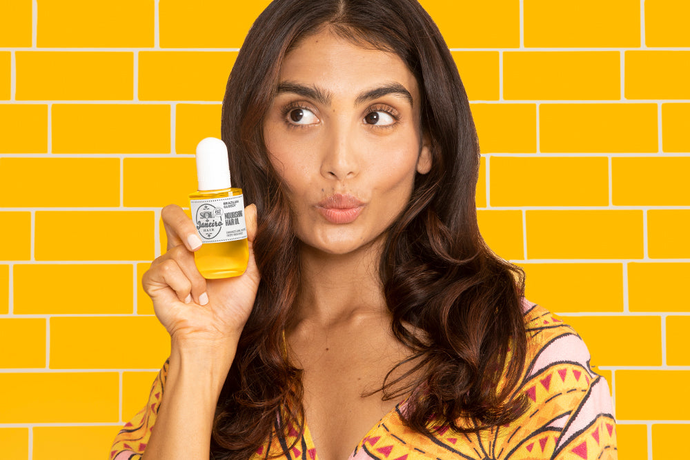 Model with hair oil