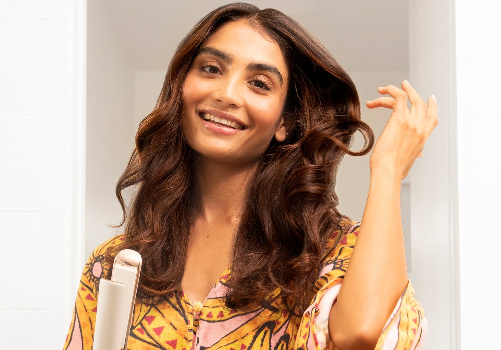 Woman styling her hair