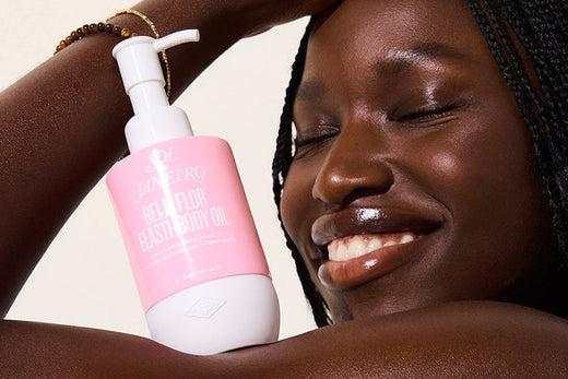 model smiling with beija flor body oil