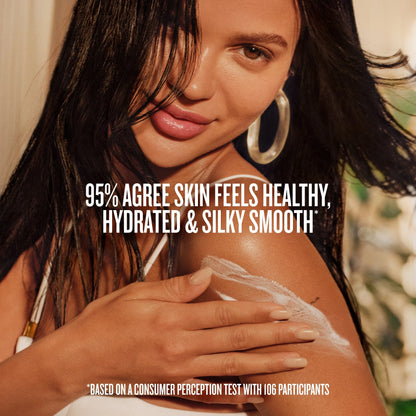 Text on image reads &quot;95% agree skin feels healthy, hydrated and silky smooth* Based on a consumer perception test with 106 participants&quot; This image features a model smiling and using Sol de Janeiro Badalada Lotion