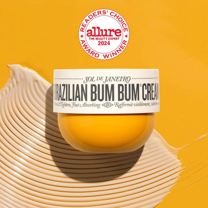 This image is of Sol de Janeiro Brazilian Bum Bum Cream. It is of a yellow background, the same color as Brazilian Bum Bum Cream with an Allure award on it as well as goop shot of the cream. 
The text on the image reads as follows: allure 2024 the beauty expert